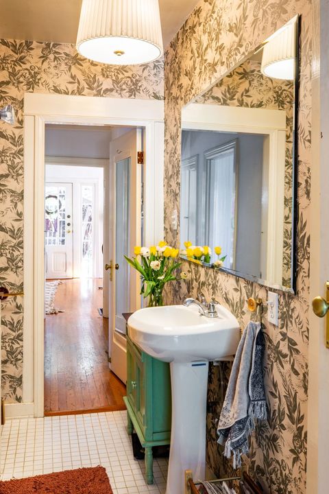 small bathroom with floral wallpaper