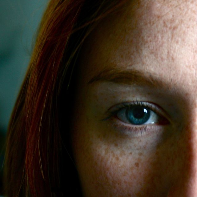 freckle faced blue eyed girl