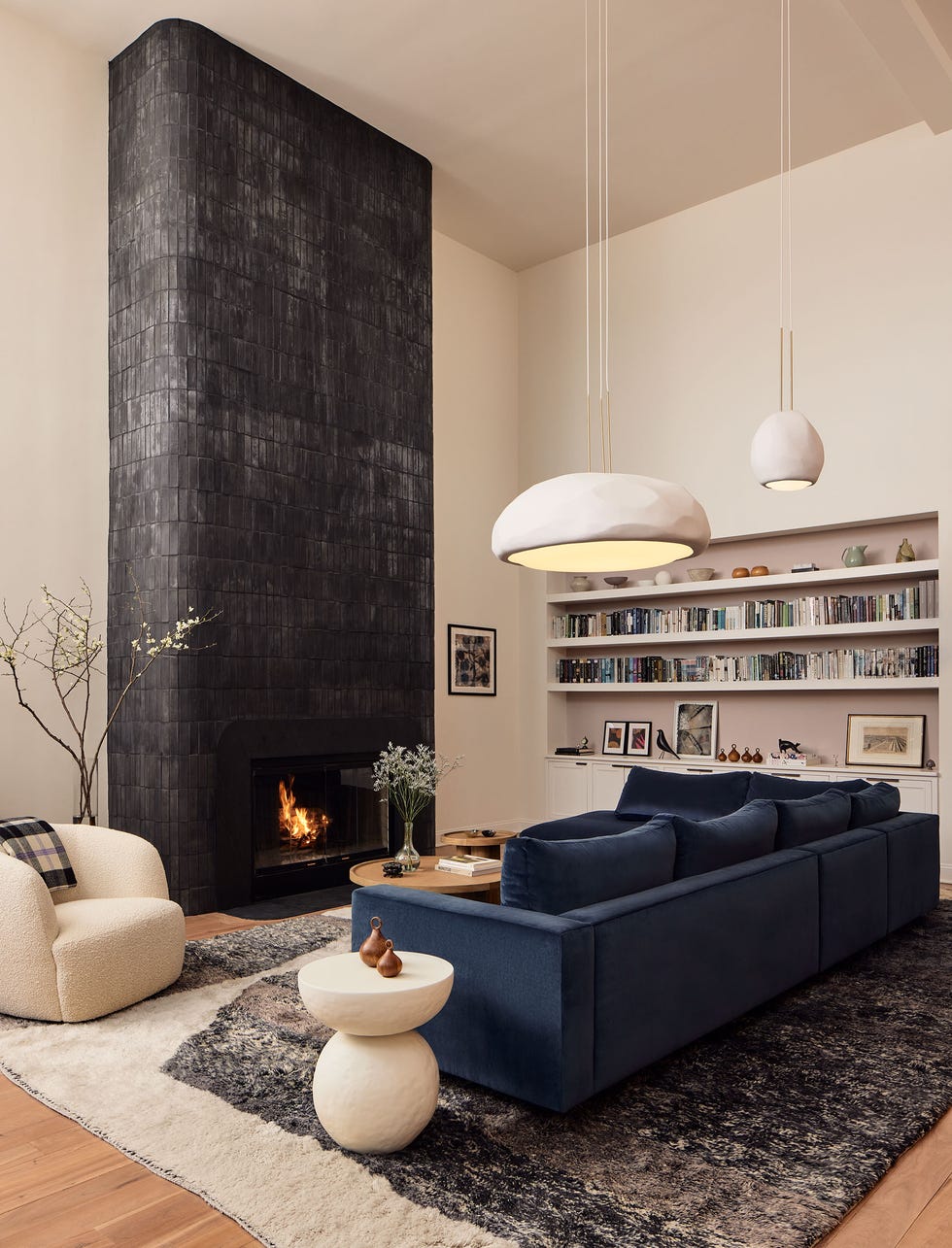 a living room with a fireplace a living room with a fireplace