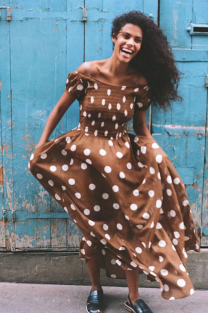 model in a free people polka dot dress