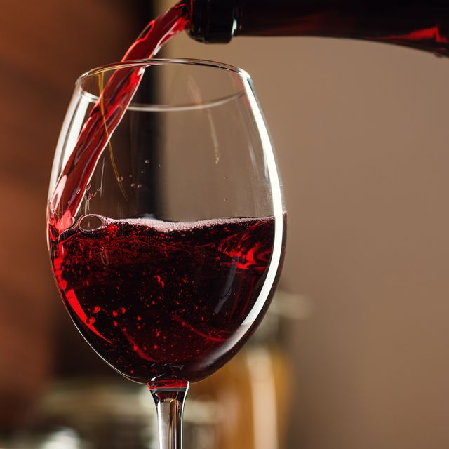 freeze motion in pouring glass of french red wine