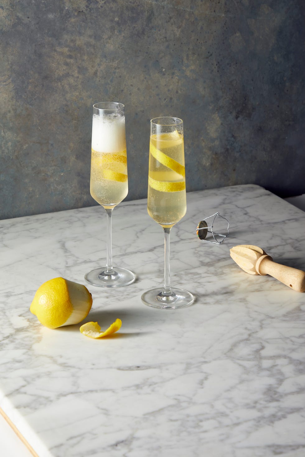 sparkling french 75 cocktail in a flute glass