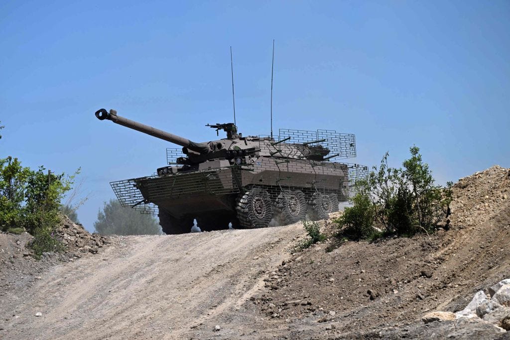 french-army-soldiers-ride-in-an-amx-10-rc-armoured-vehicle-news-photo-1672937735.jpg