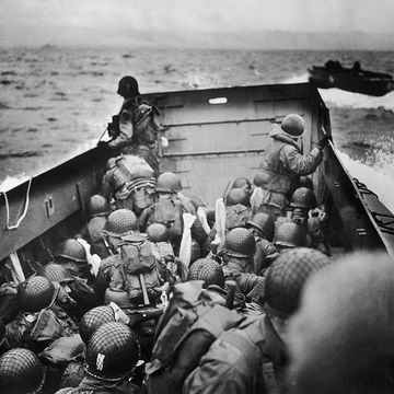 american troops riding barge to normandy