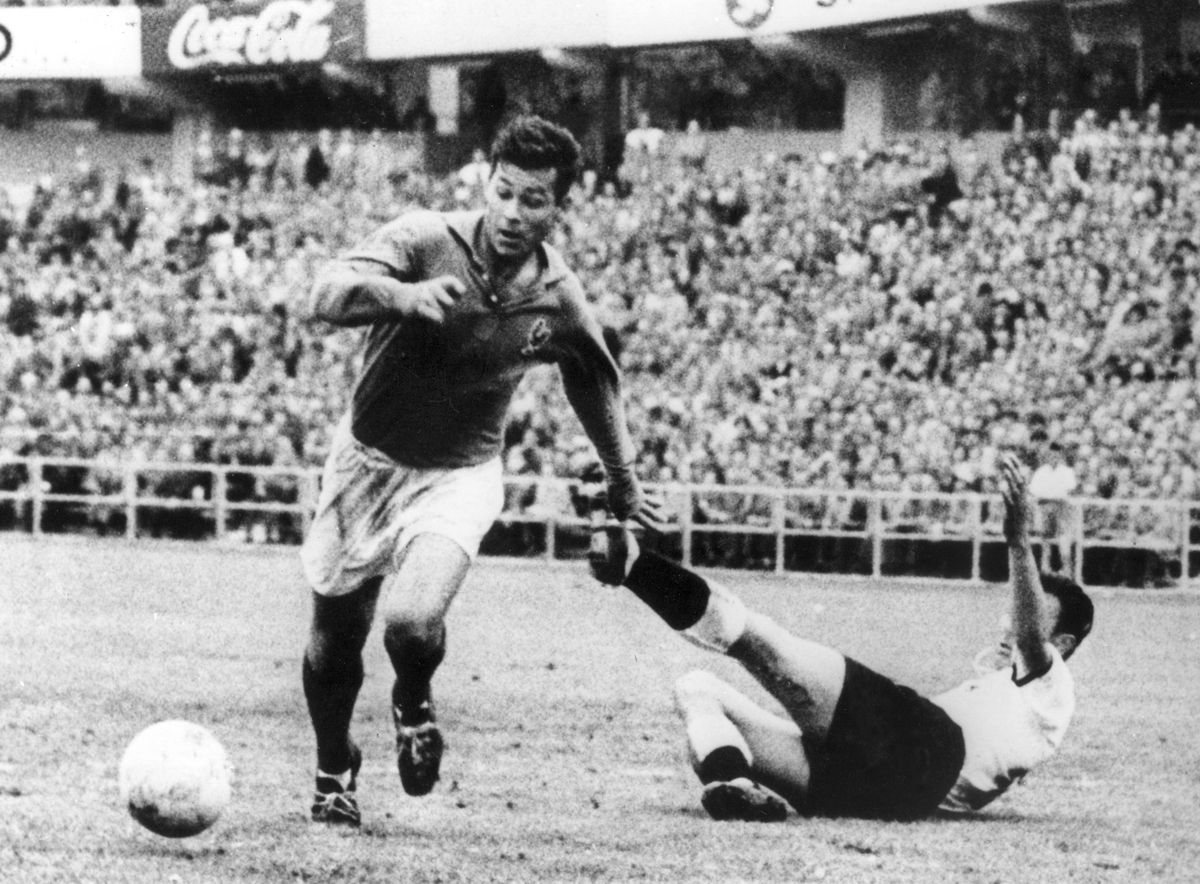 just fontaine handles soccer ball next to goalkeeper on ground