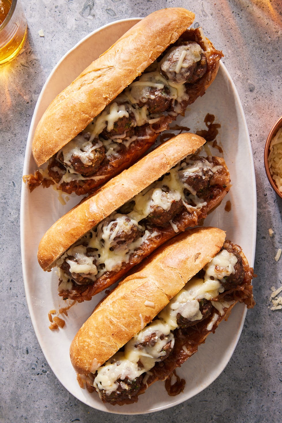 french onion meatball sub with melty gruyere