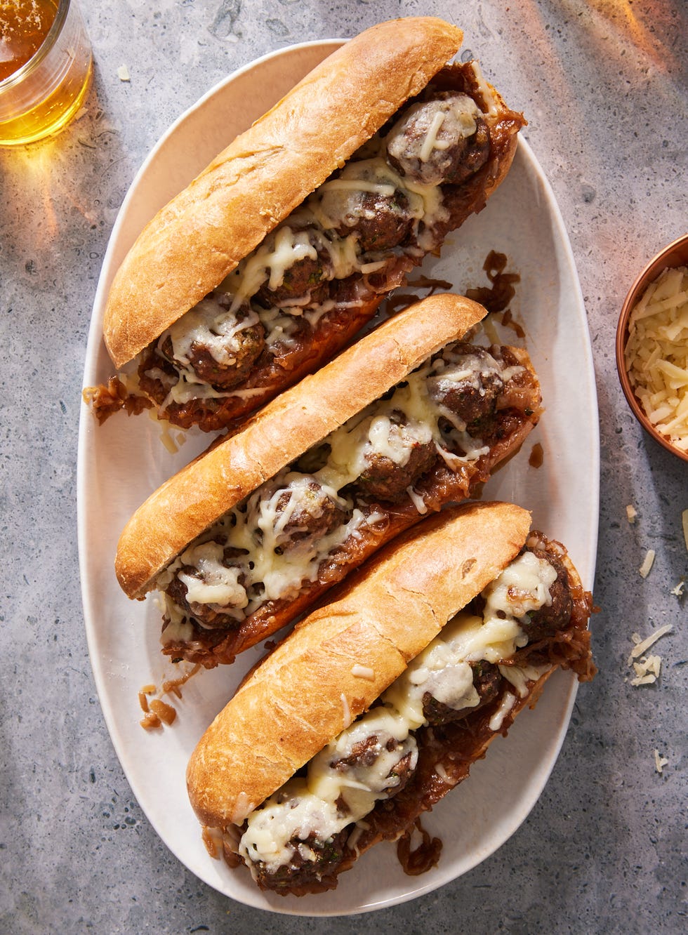 french onion meatball sub with melty gruyere