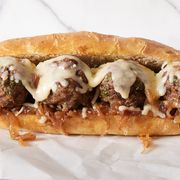 french onion meatball sub with melty gruyere