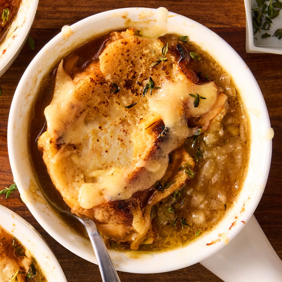 french onion soup with melted cheese and bread slices