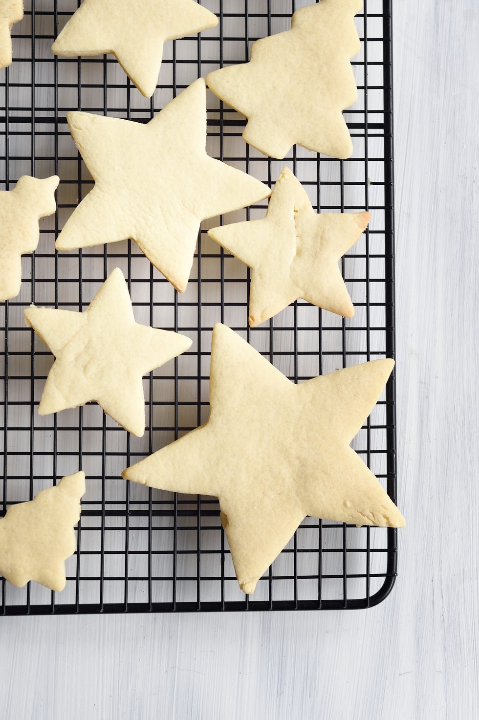 fresh baked christmas cookies on a wire rack