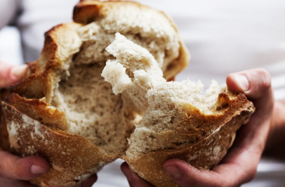 breaking bread with hands