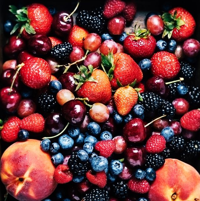 fresh summer fruits carry, berries, peaches