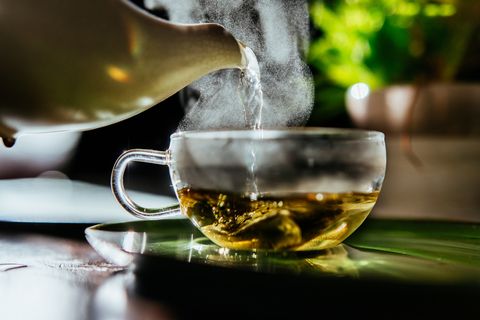 fresh hot water for organic sage herbal tea at teatime