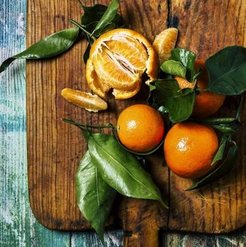 oranges on a wooden board