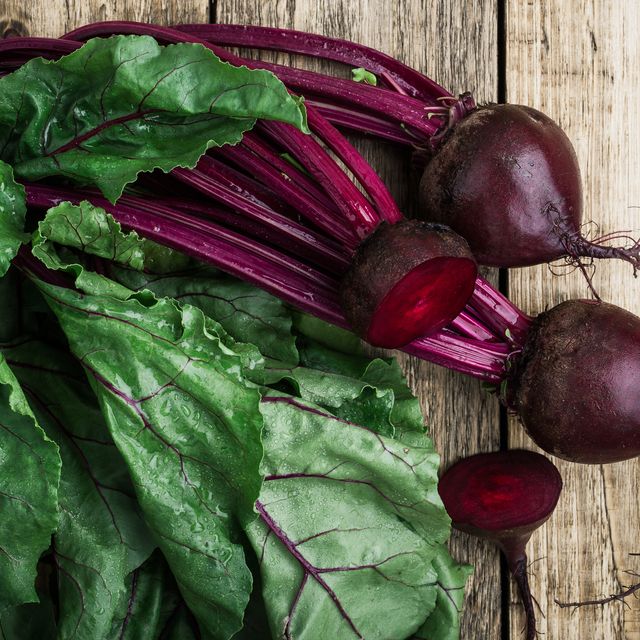 Fresh organic beetroot over wooden background