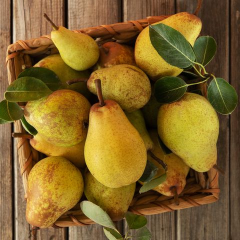 fresh organic pears on an old wooden background