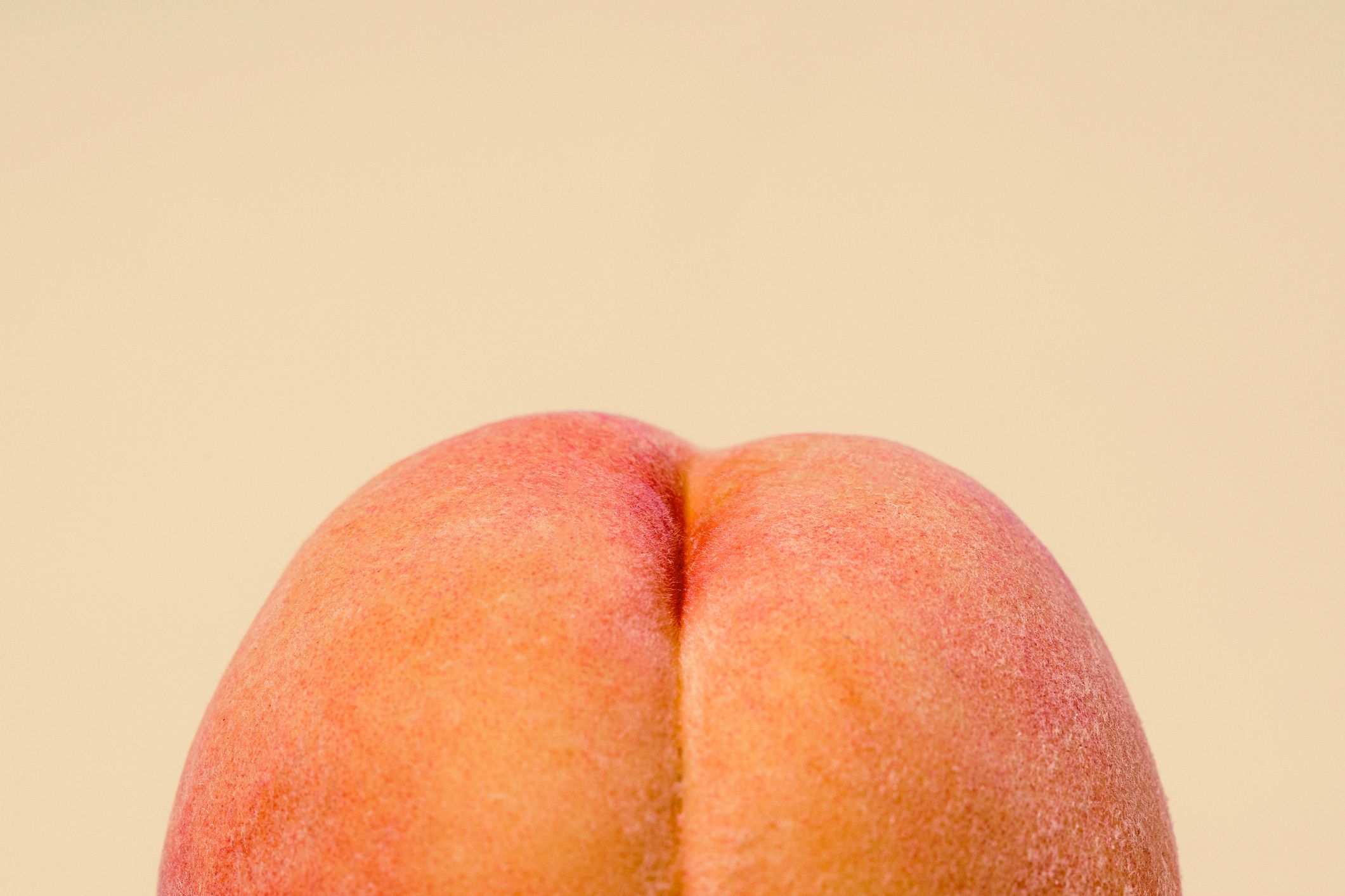 fresh peach on peach colored background