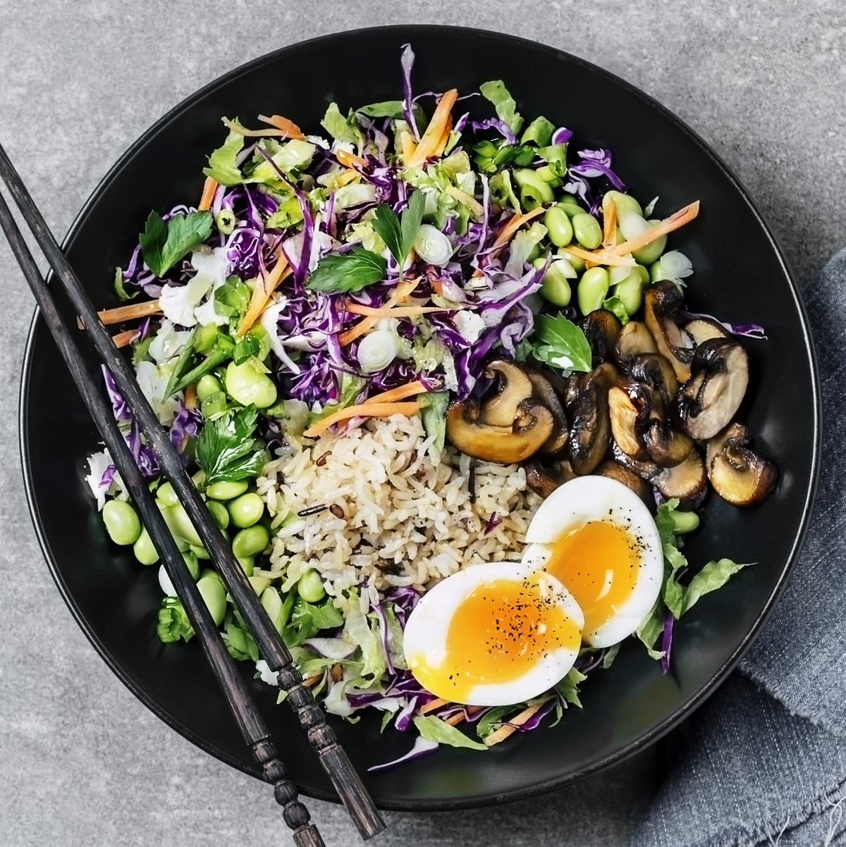 Fresh salad with fried rice and boiled eggs