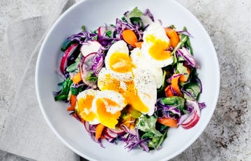 Fresh salad with soft boiled eggs