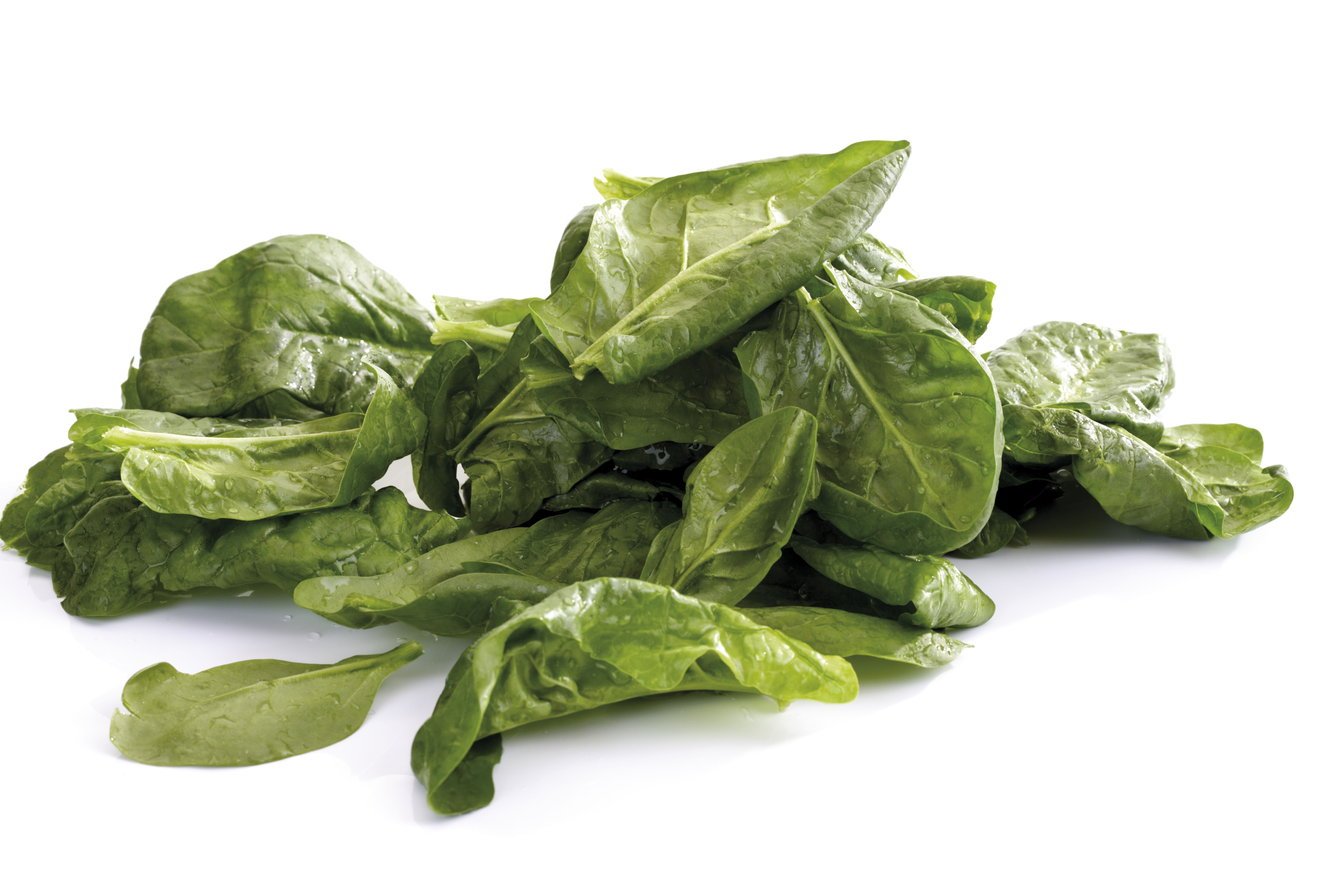 Heap of fresh cut organic vegetables isolated on white background