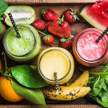 Freshly blended fruit smoothies of various colors and tastes