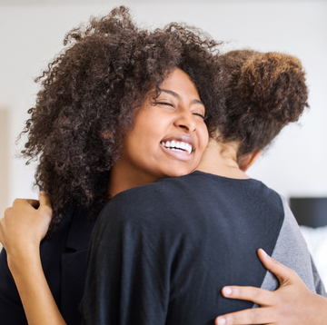 colleagues hugging