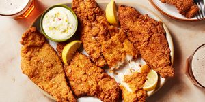 catfish battered and fried served with lemon wedges