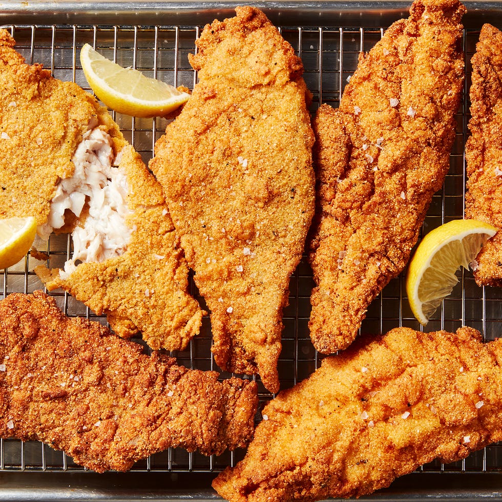 catfish battered and fried served with lemon wedges