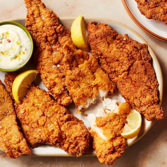 catfish battered and fried served with lemon wedges