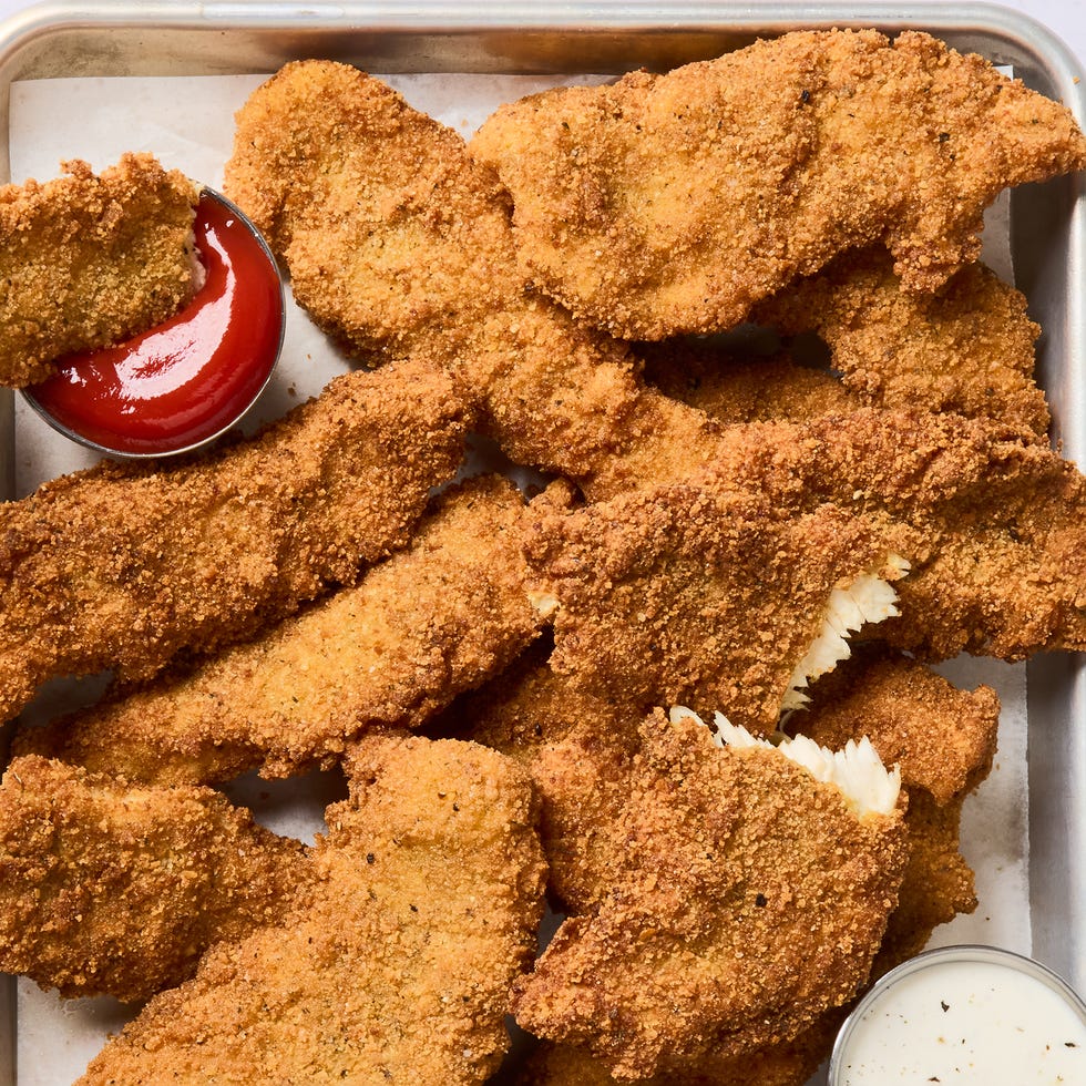 fried chicken strips served with ketchup and ranch