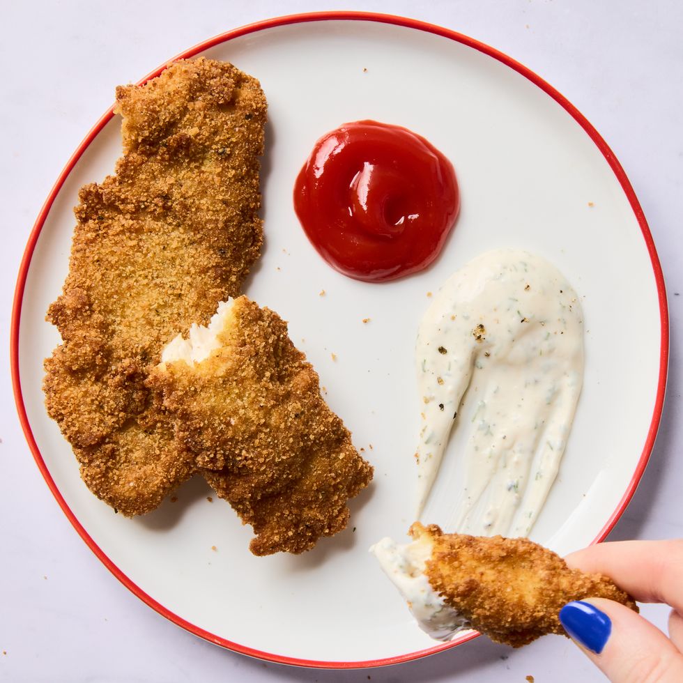 fried chicken strips served with ketchup and ranch