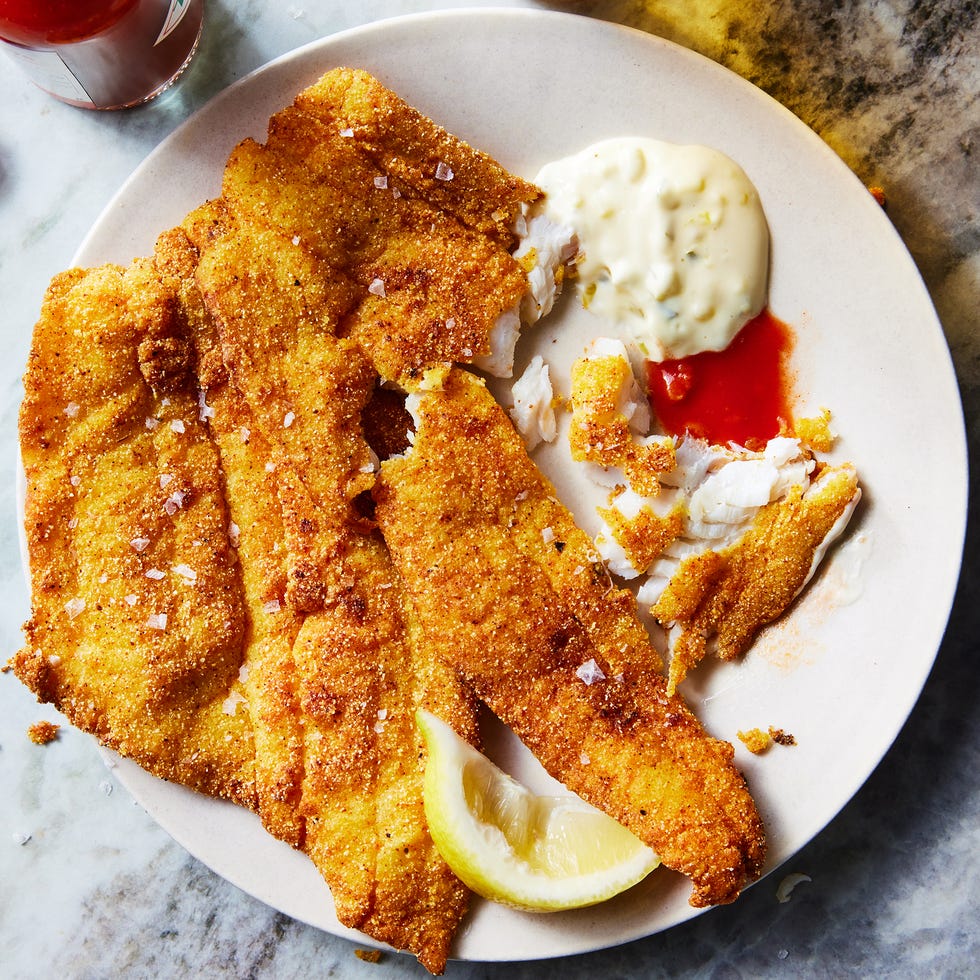 fried fish on a plate with tartar sauce