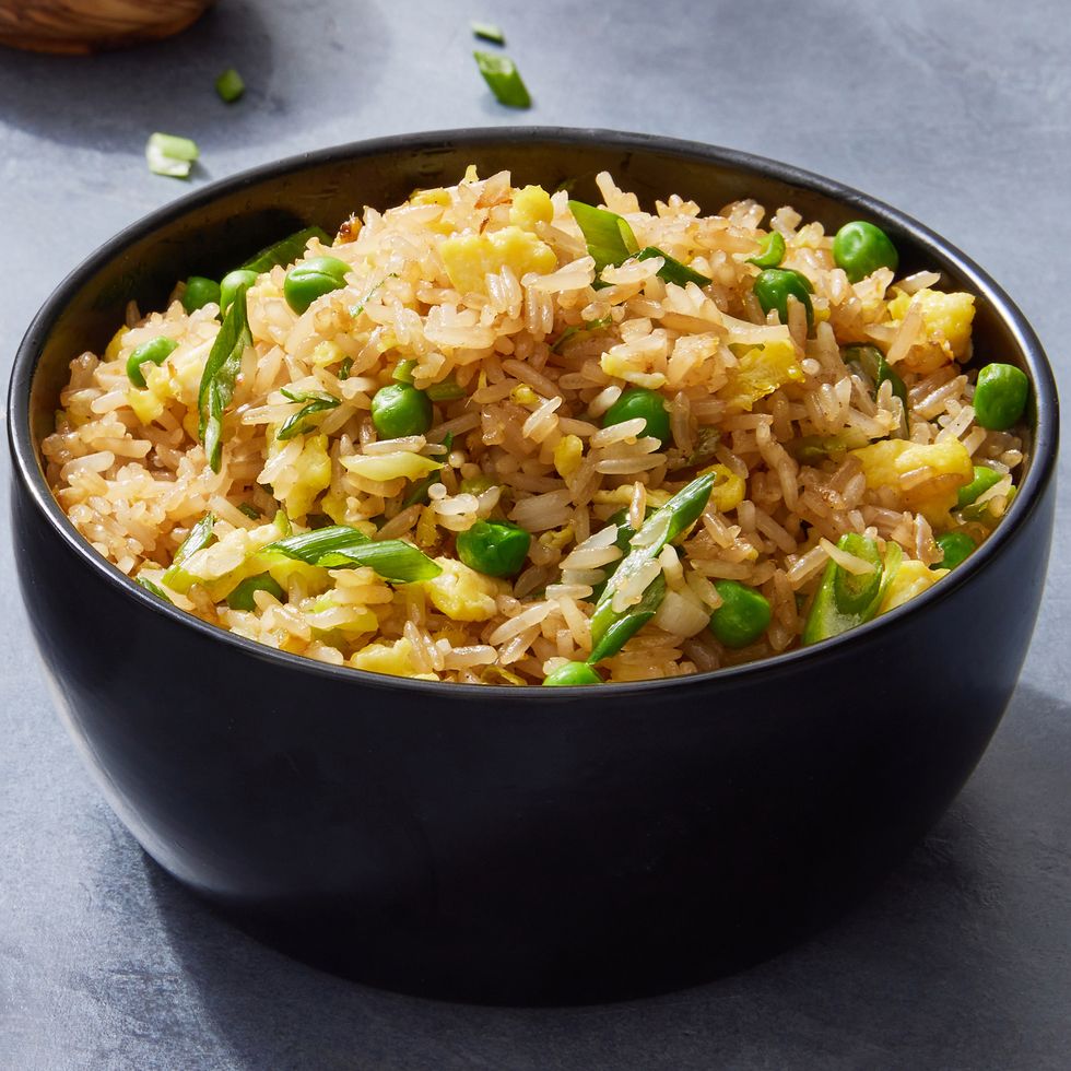 fried rice with peas, eggs, and green onions