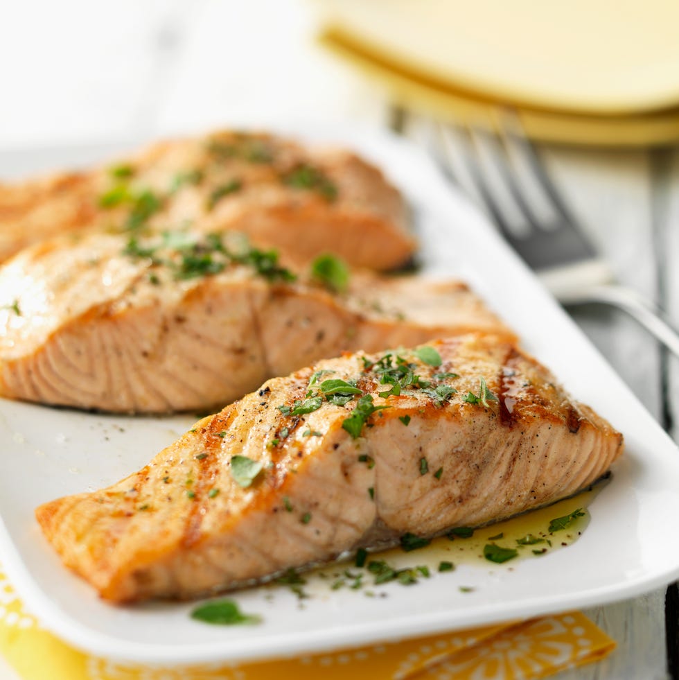 Fried salmon fillets on plate, close-up fried salmon fillets on plate, close up