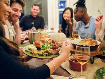 friends celebrating thanksgiving dinner together