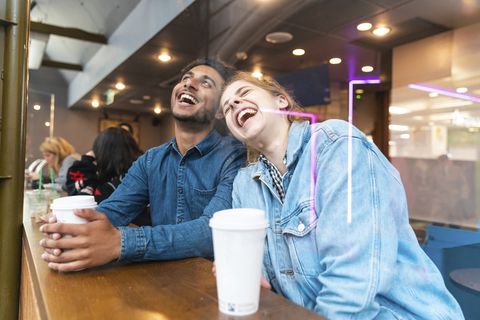 friends having fun together in a coffee shop