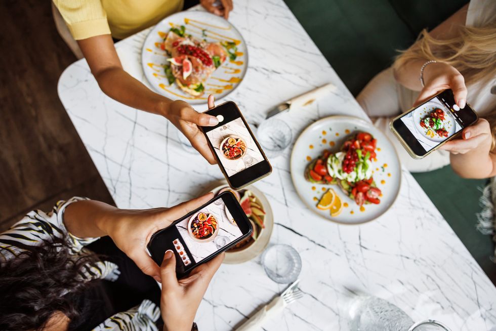 friends sharing food photography fun