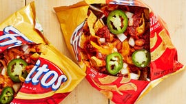 chili, jalapenos, onions, and fritos inside a frito bag