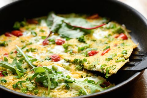 frittata with cherry tomatoes greens and cheese