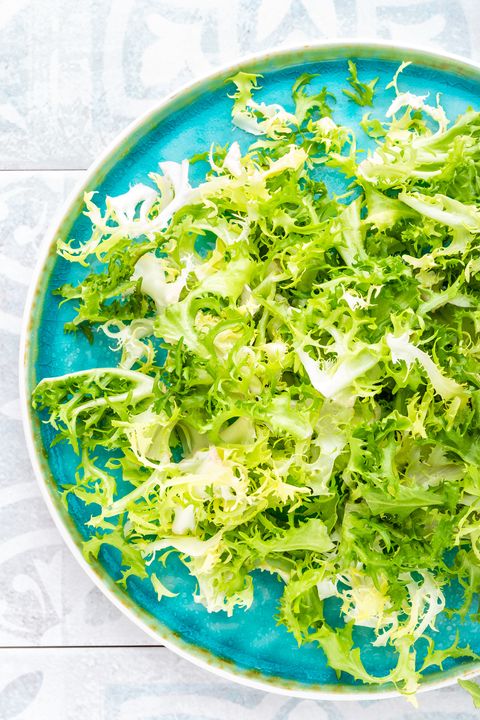 Frize lettuce salad, fresh frisee. Healthy vegetarian food