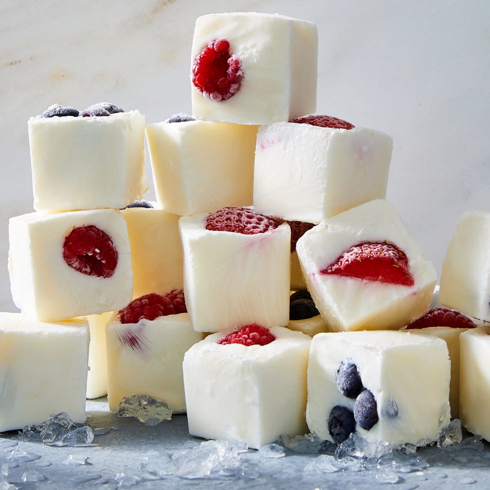 frozen yogurt cubes with pieces of fruit in them