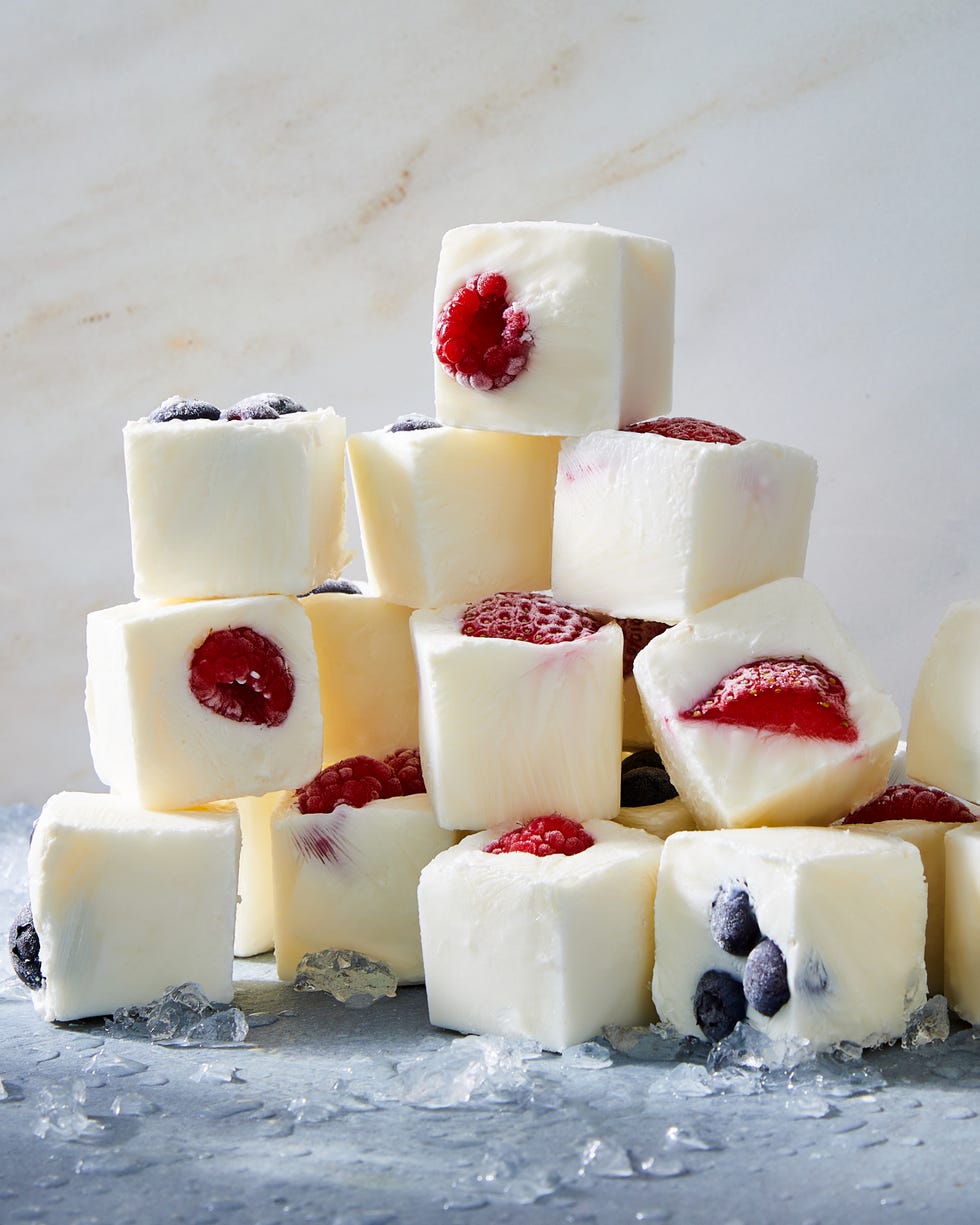 frozen yogurt cubes with pieces of fruit in them