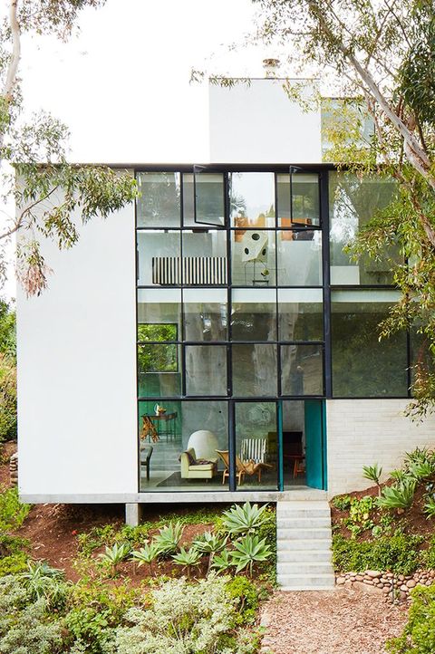 concrete home with open windows