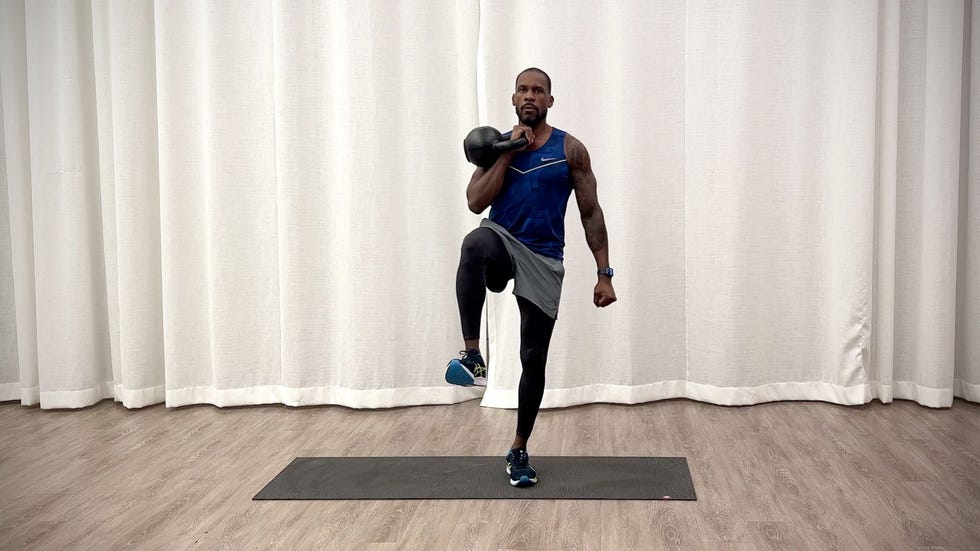 beginner kettlebell workout, jeffers practices front racked march exercise
