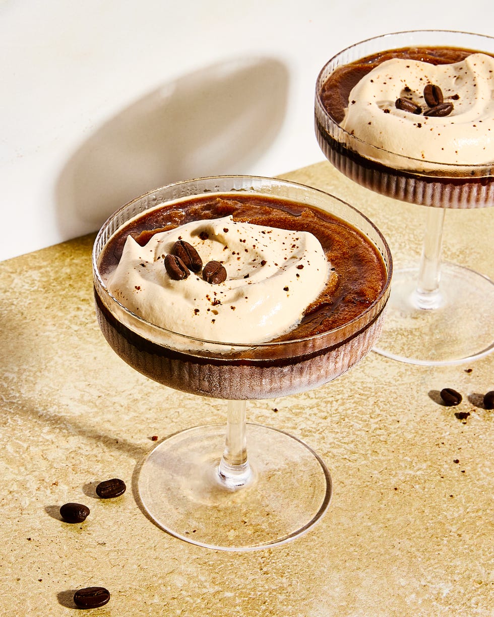 frozen espresso martini with foam and coffee beans on top