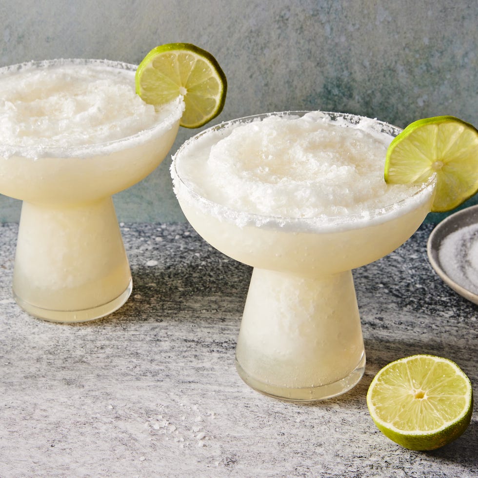 frozen margarita with a salt rim and lime wedge