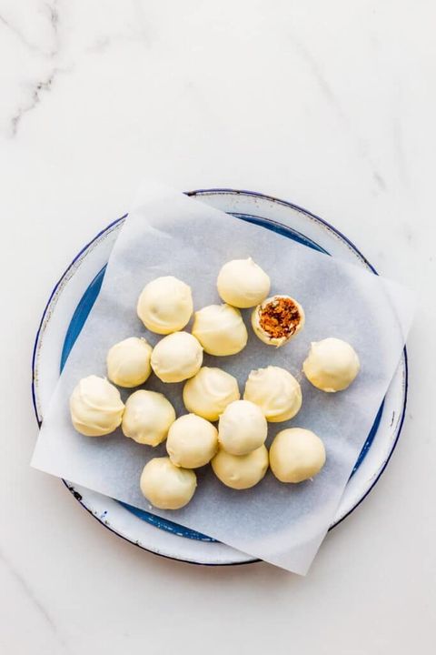 christmas cake balls covered in white chocolate