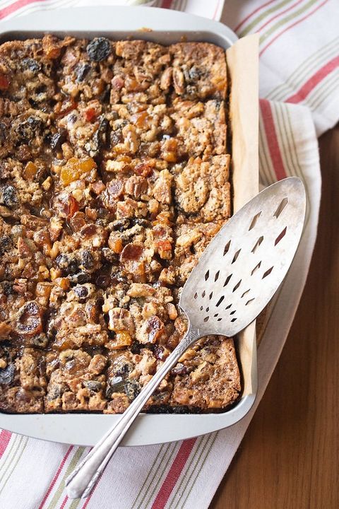 gooey fruit cake bars with silver server