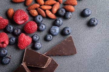 fresh raspberries blueberries almonds and chocolate