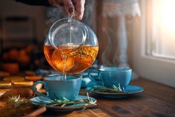 fruit tea with oranges, cinnamon and rosemary